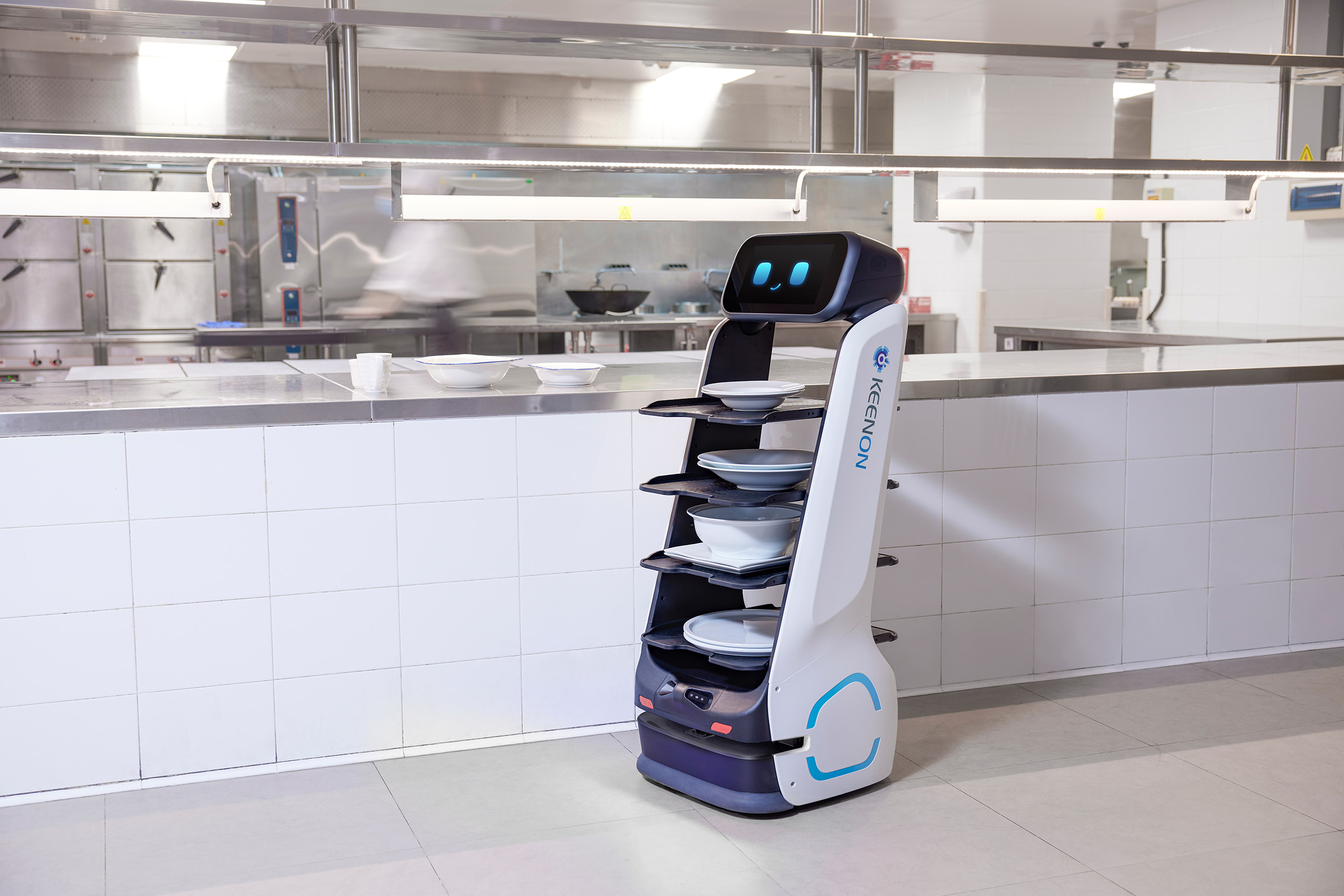 Keenon DINERBOT T9 delivery robot in a hotel kitchen